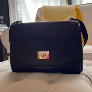 Black, scalloped Kate Spade handbag